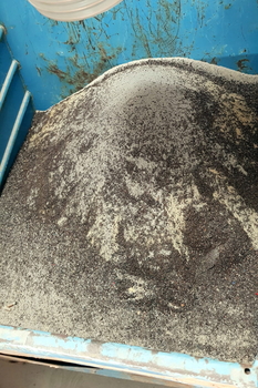 Magnetic grate separator in housing MSS-AC in a chute of dry mortar mix