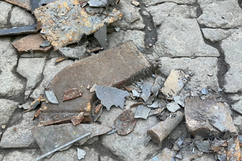 Captured metal contaminants in a cement plant area