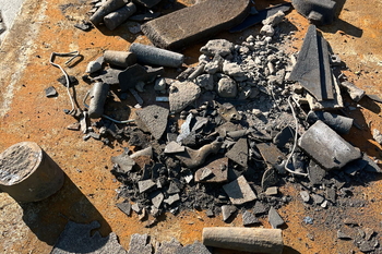Captured metal contaminants in a cement plant area