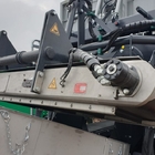 Magnetic self-cleaning plate for mobile crushers and screeners